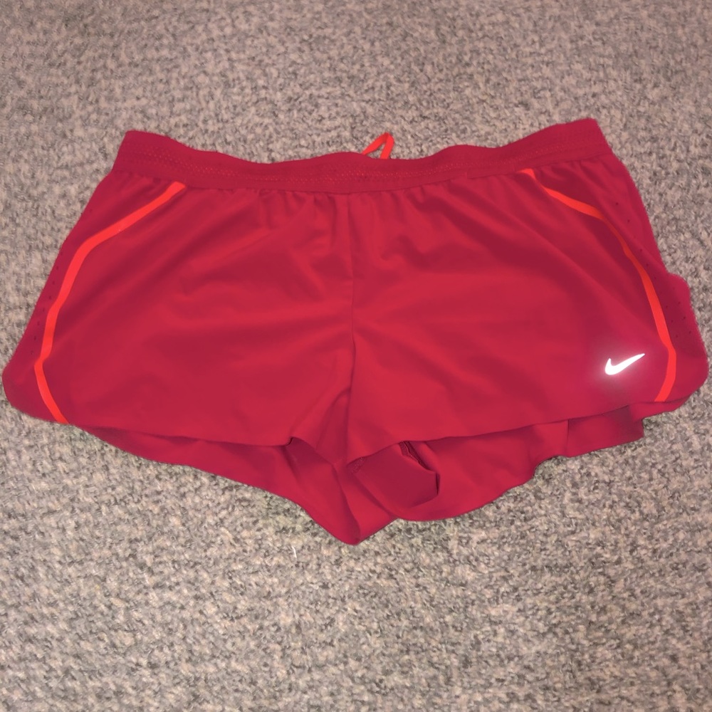 Nike swish short athletic shorts, dark pink in color size XL